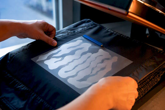 DTF transfer being pressed onto nylon fabric