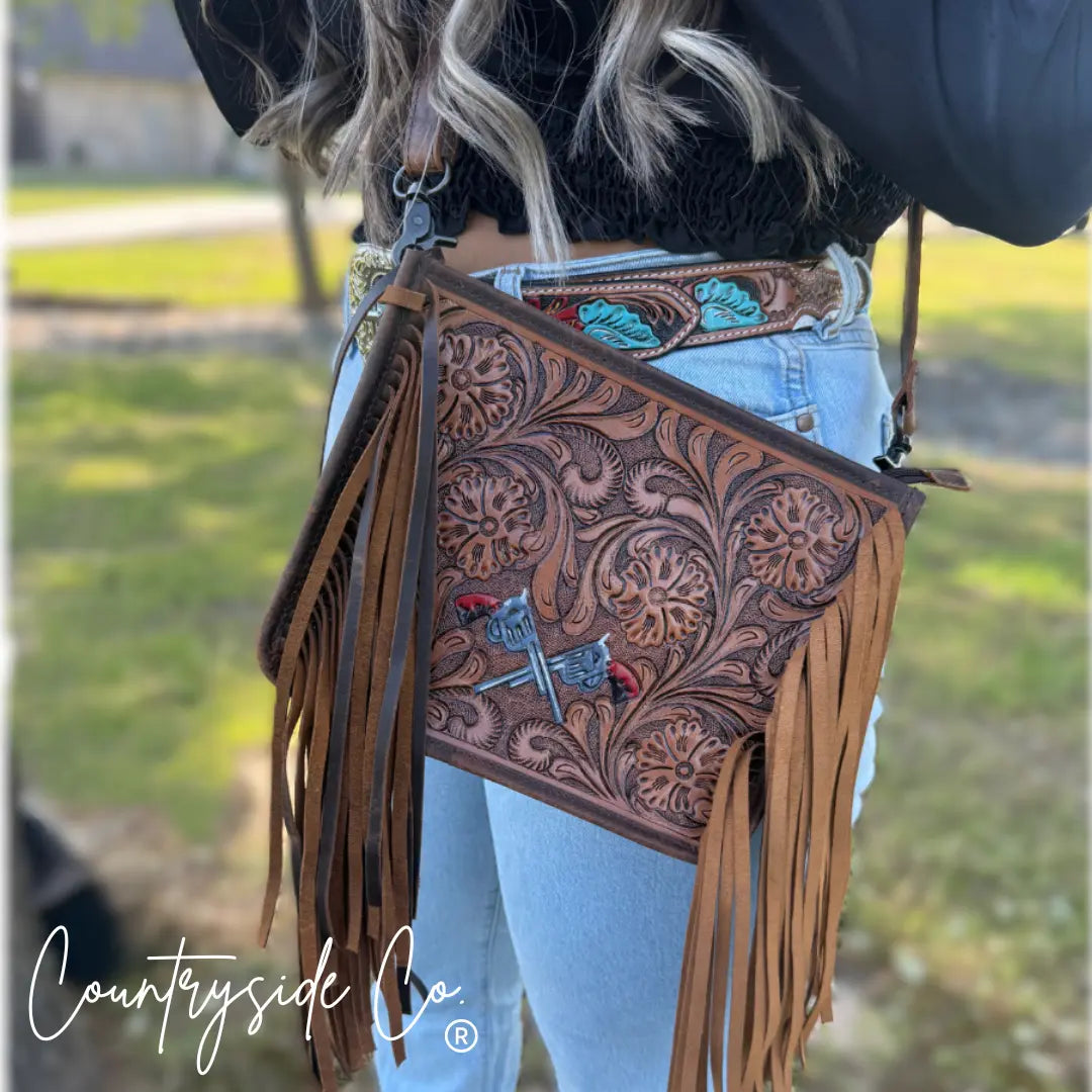 The Desert Duel Tooled Leather Purse by Countryside Co. Countryside Co.