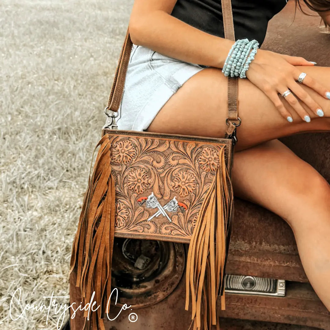 The Desert Duel Tooled Leather Purse by Countryside Co. Countryside Co.